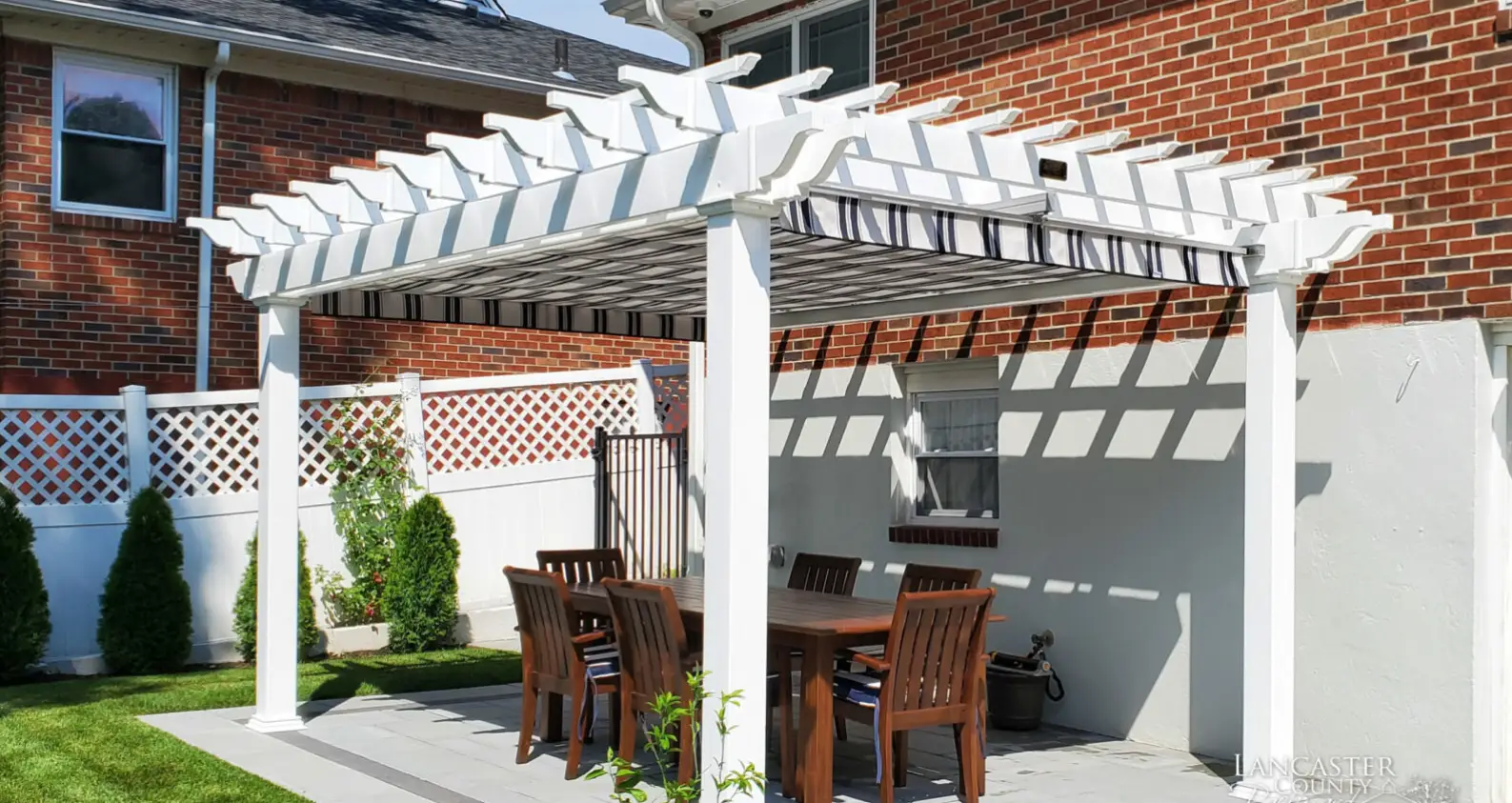 vinyl backyard patio pergola featuring navy taupe fancy shad can